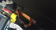 电脑排线盖板更换教程（手把手教你更换电脑排线盖板，让电脑焕然一新）